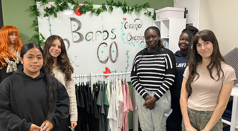 Students engaged in simulated customer service training program at the Aengus Kavanagh Education and Equity Centre in Mount Druitt