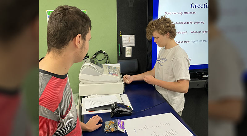 Students practising point of sale skills