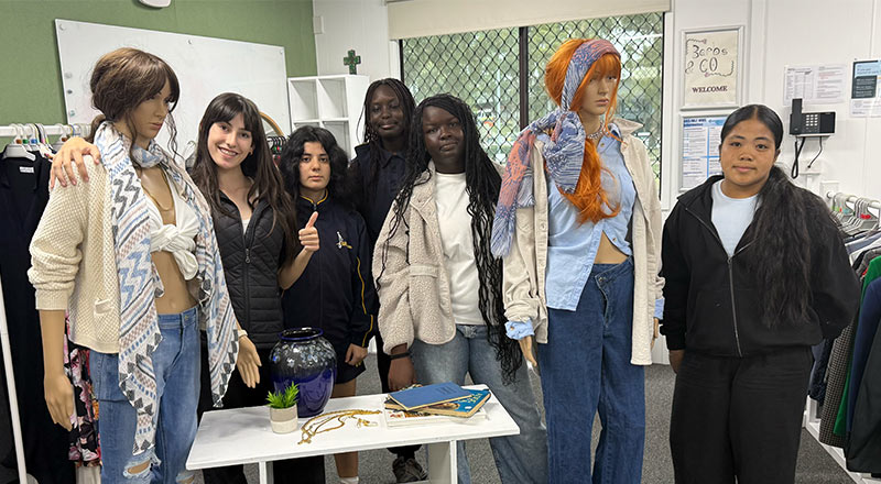 Students roleplaying work in a retail environment