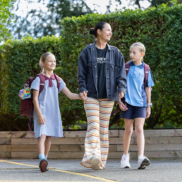 Mother and children walking to Catholic Schools Parramatta Diocese Primary School