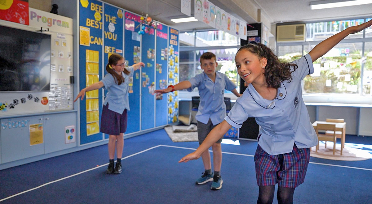 Students from St Finbar's Primary Glenbrook practising the Dragonfly Dance which they will present at the conference.