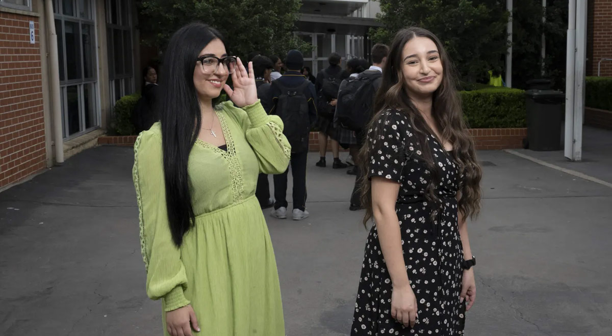Recent teaching graduates Merna Oraha and Yasemin Kurt at St Agnes Catholic High School.