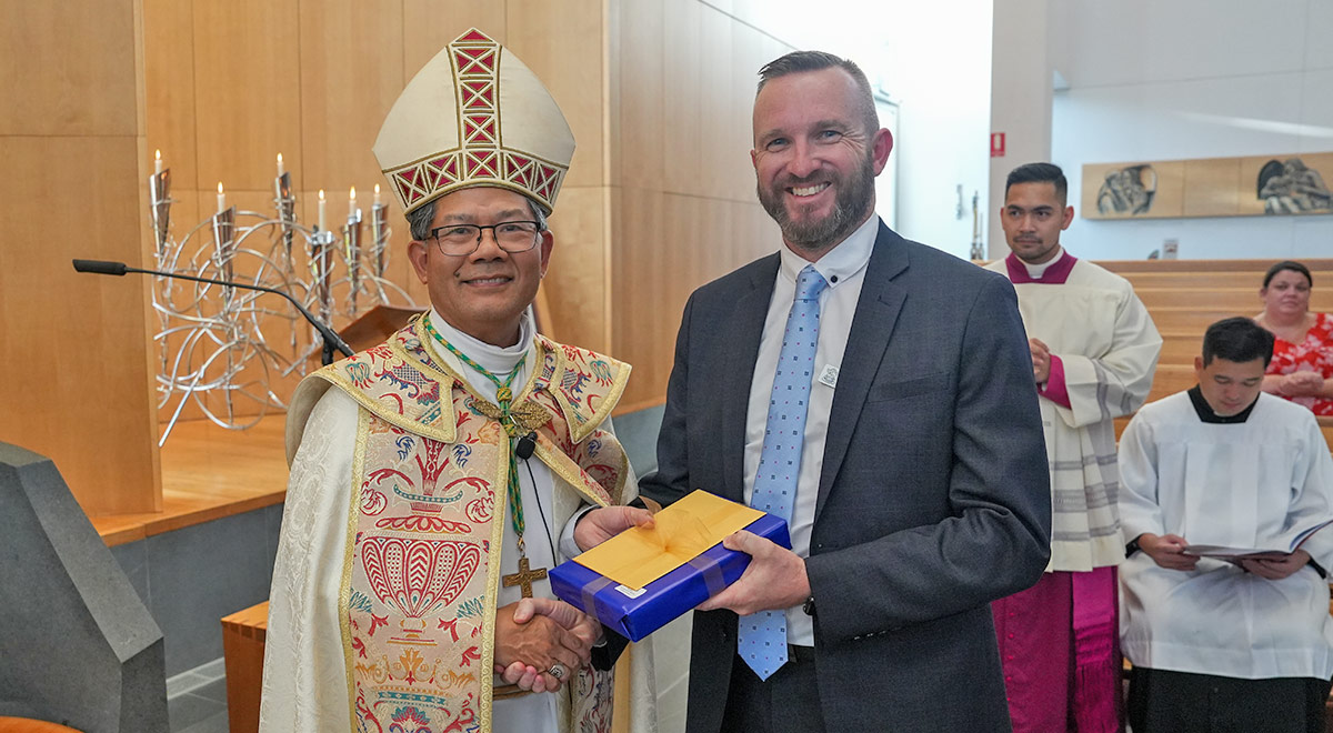 Matthew Bond and Bishop Vincent Long Van Nguyen at the Commissioning Ceremony.