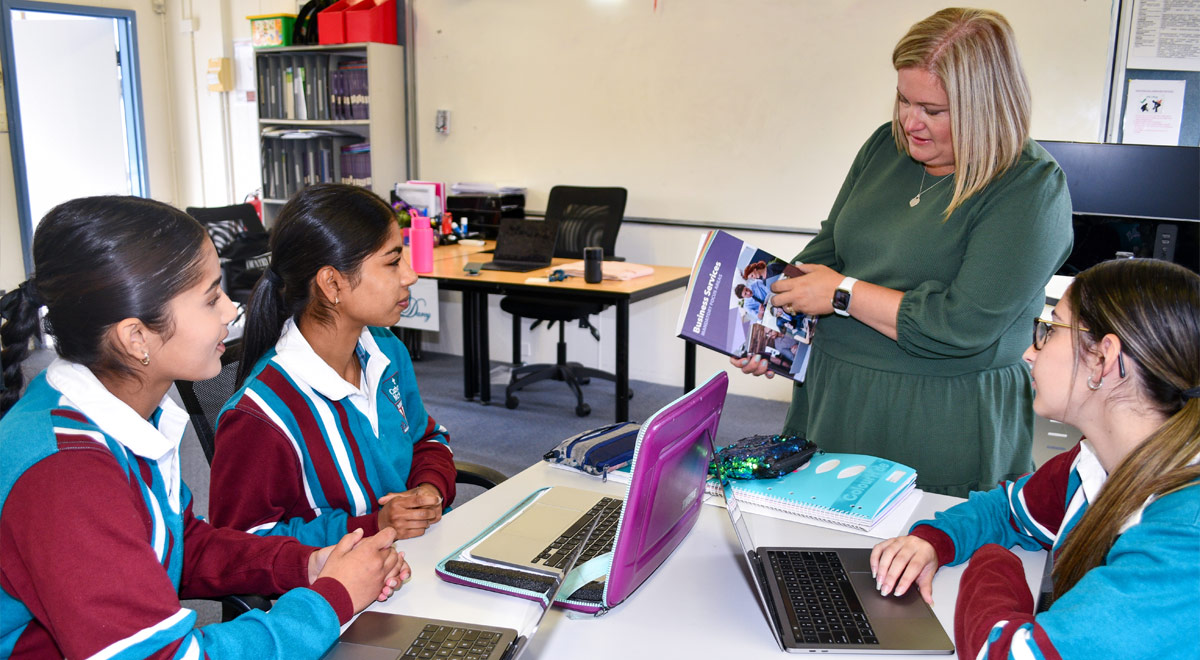 Taryn Grima teaching students during a Business Services VET class at Catherine McAuley Westmead.