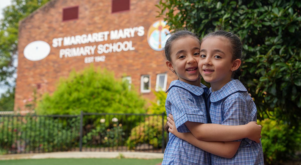 Twin sisters Amelia and Isabelle Raad are excited to start school at St margaret Mary's Primary, Merrylands
