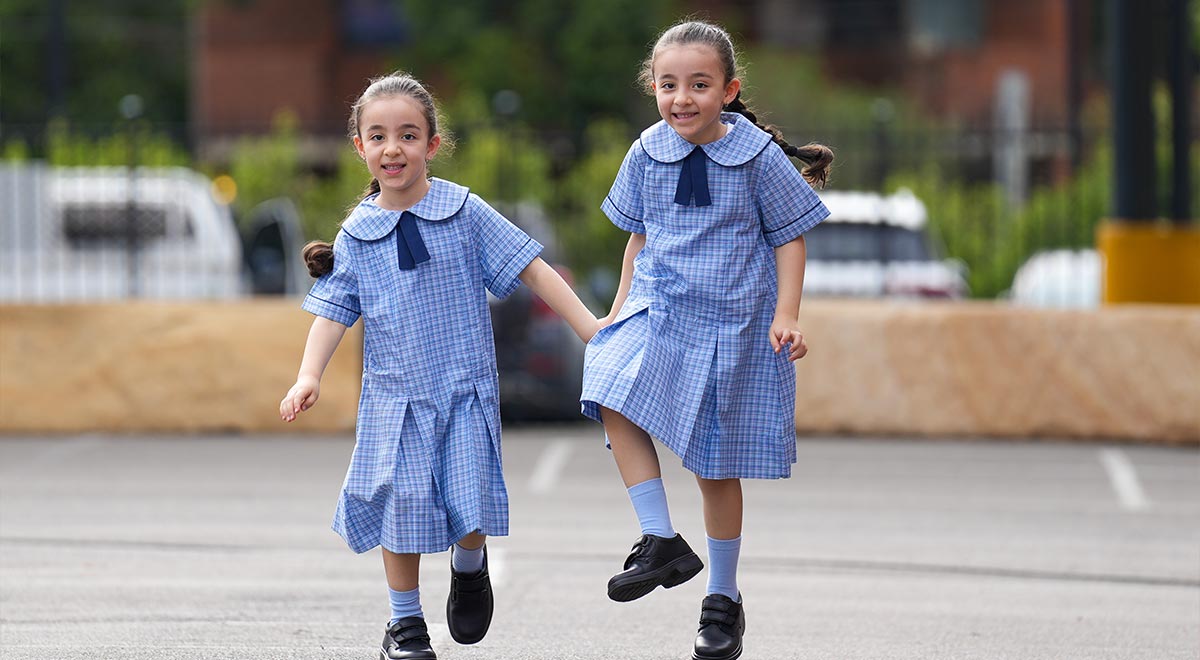 Twin sisters Amelia and Isabelle Raad are excited to start school at St margaret Mary's Primary, Merrylands