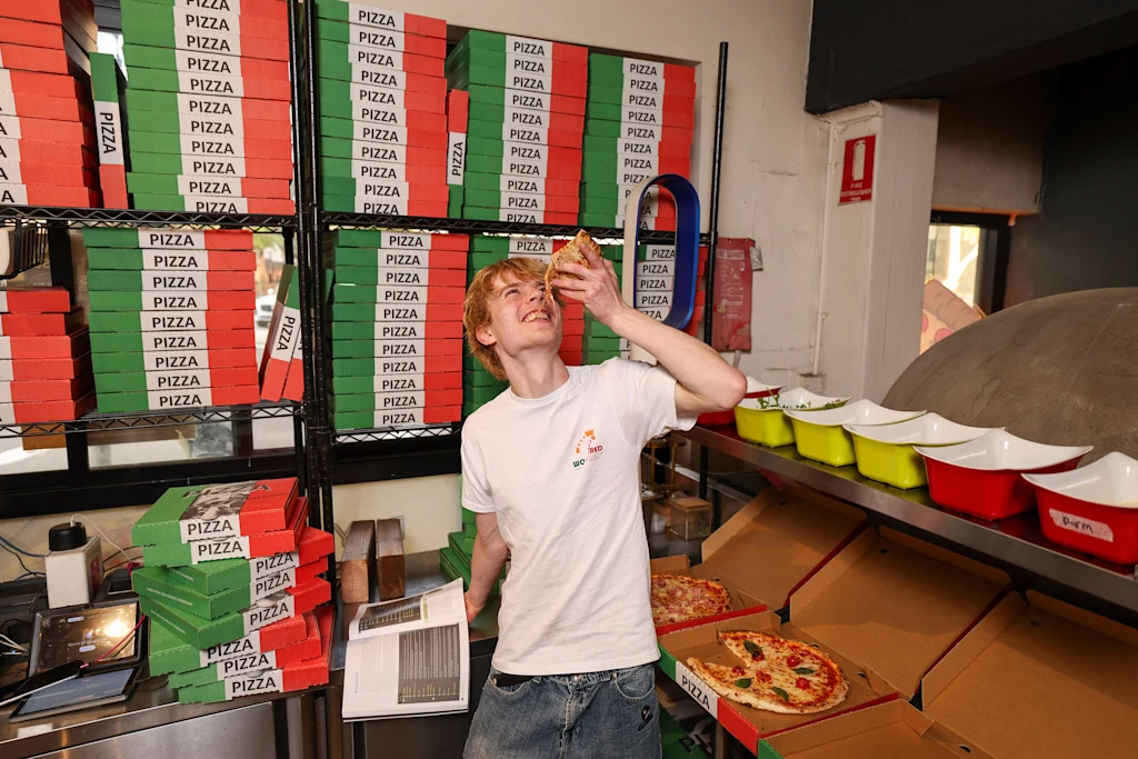 Marlow Ross from Marrickville High has stuck English quotes around the pizza shop where he works. Credit: Dylan Coker