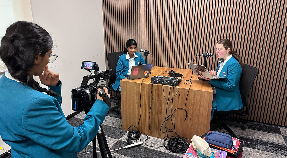 Year 8 students making a podcast in their Religious Education class.